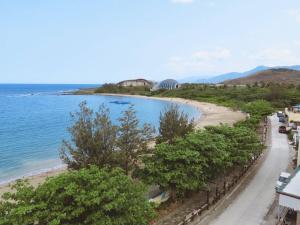a view of a beach and the ocean at Kenting Onehome in Checheng