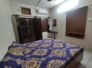 Ένα ή περισσότερα κρεβάτια σε δωμάτιο στο Himalaya Inn Guest House