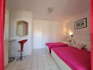 Postel nebo postele na pokoji v ubytování Apartments Ana