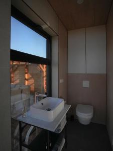 Et bad på Juniper Lux Minivilla Jacuzzi & Sauna