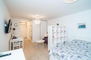 Posteľ alebo postele v izbe v ubytovaní Lenka Apartment