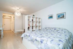 Posteľ alebo postele v izbe v ubytovaní Lenka Apartment