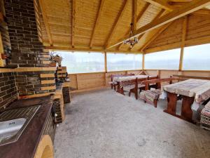 Balkón nebo terasa v ubytování Cabana Poiana Dealul Frumos