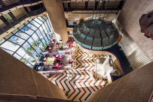 an overhead view of a building with a pool at Hotel Holiday in Sarajevo