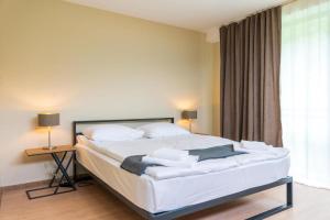 Letto o letti in una camera di Hotel Latveli Mestia