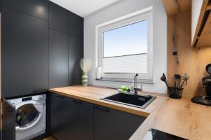 Küche/Küchenzeile in der Unterkunft ANYTIME - Rohrbach Apartments