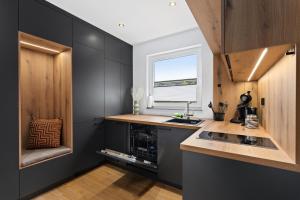 Küche/Küchenzeile in der Unterkunft ANYTIME - Rohrbach Apartments