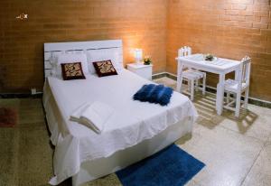 Кровать или кровати в номере Sevenday Hotel