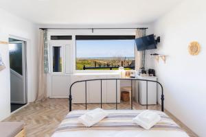 Кровать или кровати в номере Rezident Corbu