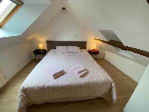 Posteľ alebo postele v izbe v ubytovaní Petite maison dans la prairie