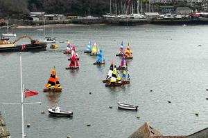 a group of small sailboats on a body of water at The Captain’s 4 Bed Penthouse in Fowey