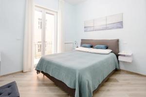 Postel nebo postele na pokoji v ubytování Maison de plage