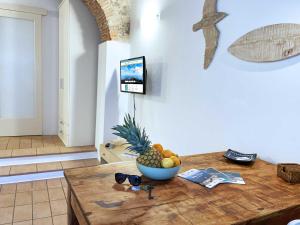 Μια τηλεόραση ή/και κέντρο ψυχαγωγίας στο Casa Cotone - Monolocale