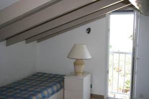 Postel nebo postele na pokoji v ubytování Maison golfe d'Ajaccio: vue mer