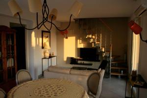 Posezení v ubytování Maison golfe d'Ajaccio: vue mer + 4 fotografie