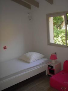 Postel nebo postele na pokoji v ubytování Maison golfe d'Ajaccio: vue mer