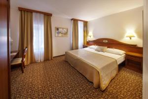 Postel nebo postele na pokoji v ubytování Hotel Convent - Hotel & Resort Adria Ankaran
