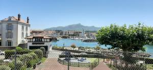 a view of a city with a body of water at Cosy in Saint-Jean-de-Luz