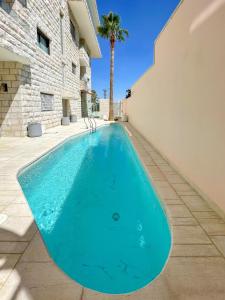 Bassein majutusasutuses Dar Al Mauge Boutique Hotel with Outdoor Pool või selle lähedal