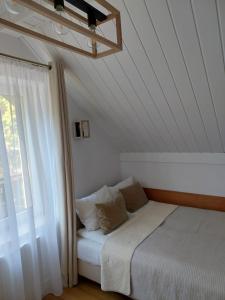 Postel nebo postele na pokoji v ubytování Willa Jack 4