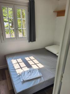 Postel nebo postele na pokoji v ubytování Camping Beaussement SWEETY