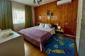 Postel nebo postele na pokoji v ubytování Villa Garden