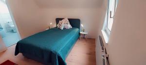 Postel nebo postele na pokoji v ubytování Hotel 24