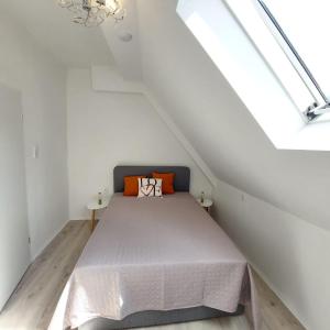 Postel nebo postele na pokoji v ubytování Hotel 24