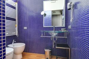 Ein Badezimmer in der Unterkunft Atmosfere Milano Marittima