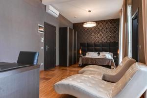 Ein Bett oder Betten in einem Zimmer der Unterkunft Atmosfere Milano Marittima