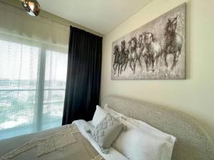 Fotografie z fotogalerie ubytování Dar Vacation - Cozy & Stylish 1BDR Apartment v Dubaji