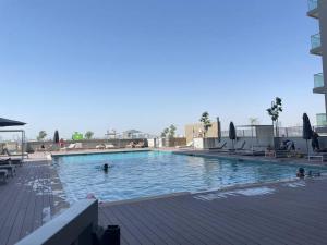 Fotografie z fotogalerie ubytování Dar Vacation - Cozy & Stylish 1BDR Apartment v Dubaji