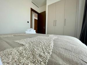 Fotografie z fotogalerie ubytování Dar Vacation - Cozy & Stylish 1BDR Apartment v Dubaji