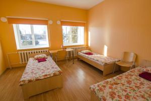 Voodi või voodid majutusasutuse Haapsalu Kutsehariduskeskuse hostel toas