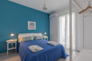 Postel nebo postele na pokoji v ubytování La Scala Suite