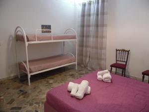 A bed or beds in a room at Casa Aurora Még 36 kép