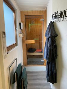 ภาพในคลังภาพของ Das Nest, opional mit Sauna und Whirlpool ในDahlem