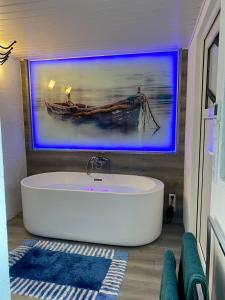 ห้องน้ำของ Das Nest, opional mit Sauna und Whirlpool
