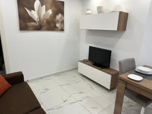 TV a/nebo společenská místnost v ubytování 10 Msida Park Residence