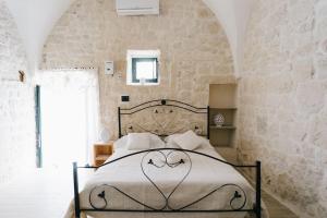 Ένα ή περισσότερα κρεβάτια σε δωμάτιο στο Casavita