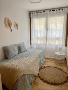 Ένα ή περισσότερα κρεβάτια σε δωμάτιο στο Vila de Cedeira