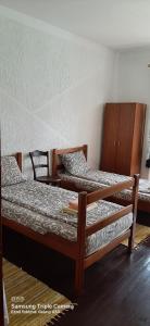 Cama o camas de una habitación en CycloCamp & Hostel