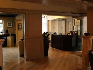 an office with a lobby with a reception desk at Lord Nelson Hotel in Liverpool