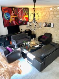 Χώρος καθιστικού στο Magnifique LOFT Appartement Chalet Climatisé Buttes Chaumont