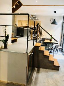 Η κουζίνα ή μικρή κουζίνα στο Magnifique LOFT Appartement Chalet Climatisé Buttes Chaumont