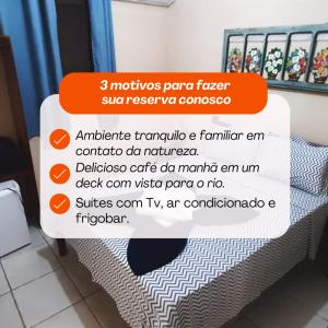 a screenshot of a text message on a bed at POUSADA PILLAR in Paraty