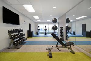 a fitness room with a gym with a treadmill at TownePlace Suites by Marriott Fall River Westport in Lakeside