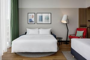Ένα ή περισσότερα κρεβάτια σε δωμάτιο στο Four Points by Sheraton Panoramahaus Dornbirn