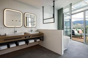 Ένα μπάνιο στο Four Points by Sheraton Panoramahaus Dornbirn