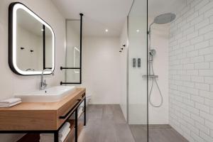 Ένα μπάνιο στο Four Points by Sheraton Panoramahaus Dornbirn